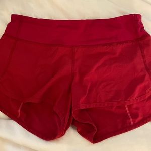 Lululemon Pink/Maroon shorts, Size 4.